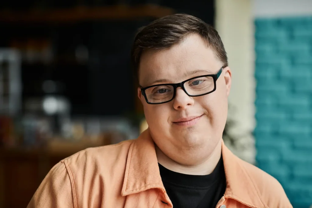 Disabled man smiling at camera